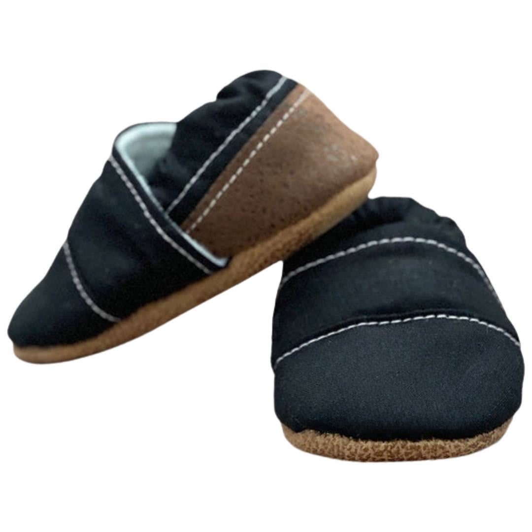 Black and brown angled baby and toddler moccasins made in USA front view