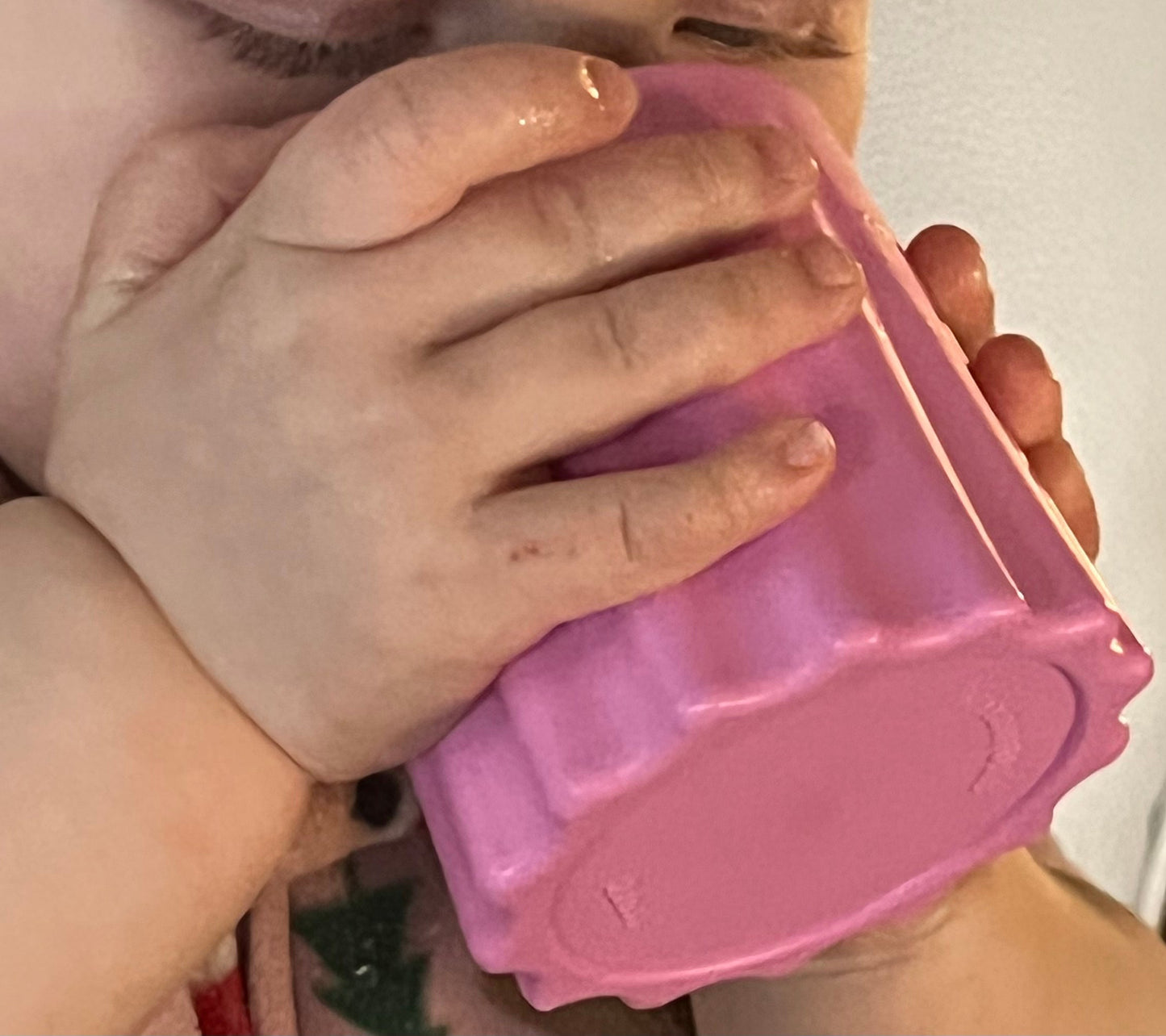 Baby Drinking From The Eztotz Pink Plastic Kid's Cup