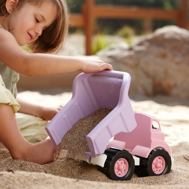 Girl Playing with the Pink & Purple Dump Truck Toy - Made in USA