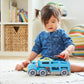 Toddler playing with the car carrier
